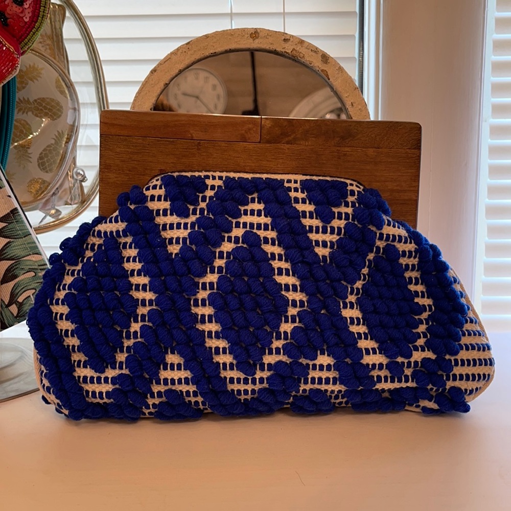 dark blue Pom Pom clutch